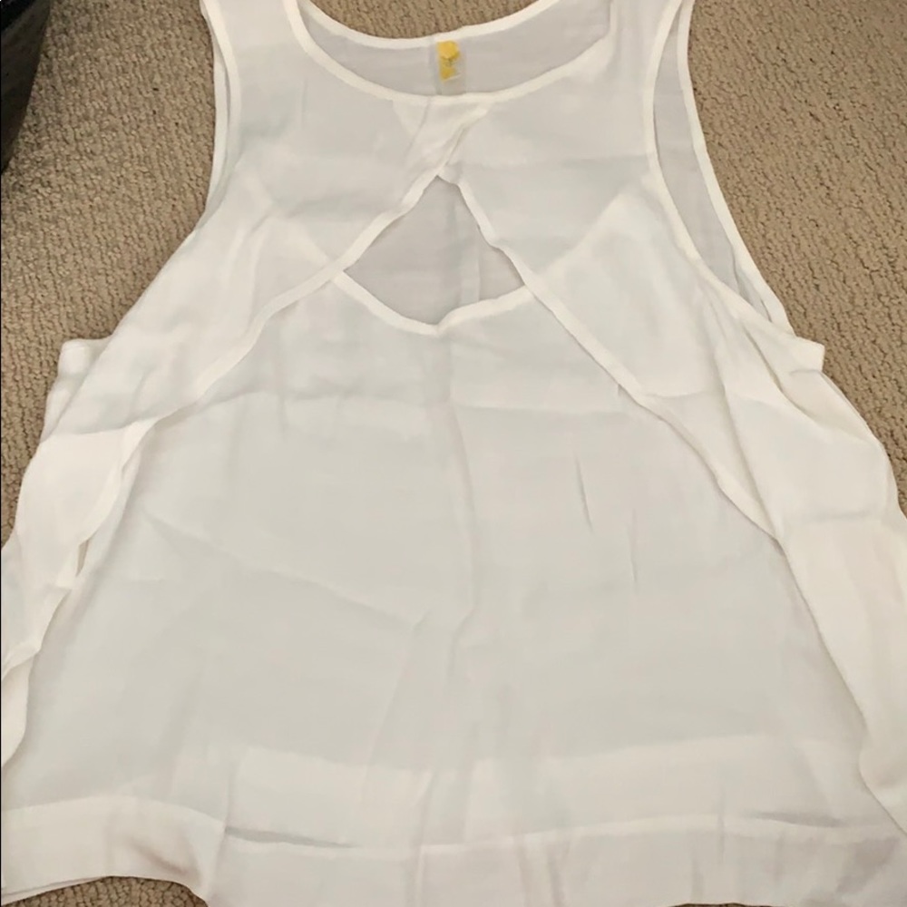 Free people white shirt with opening.